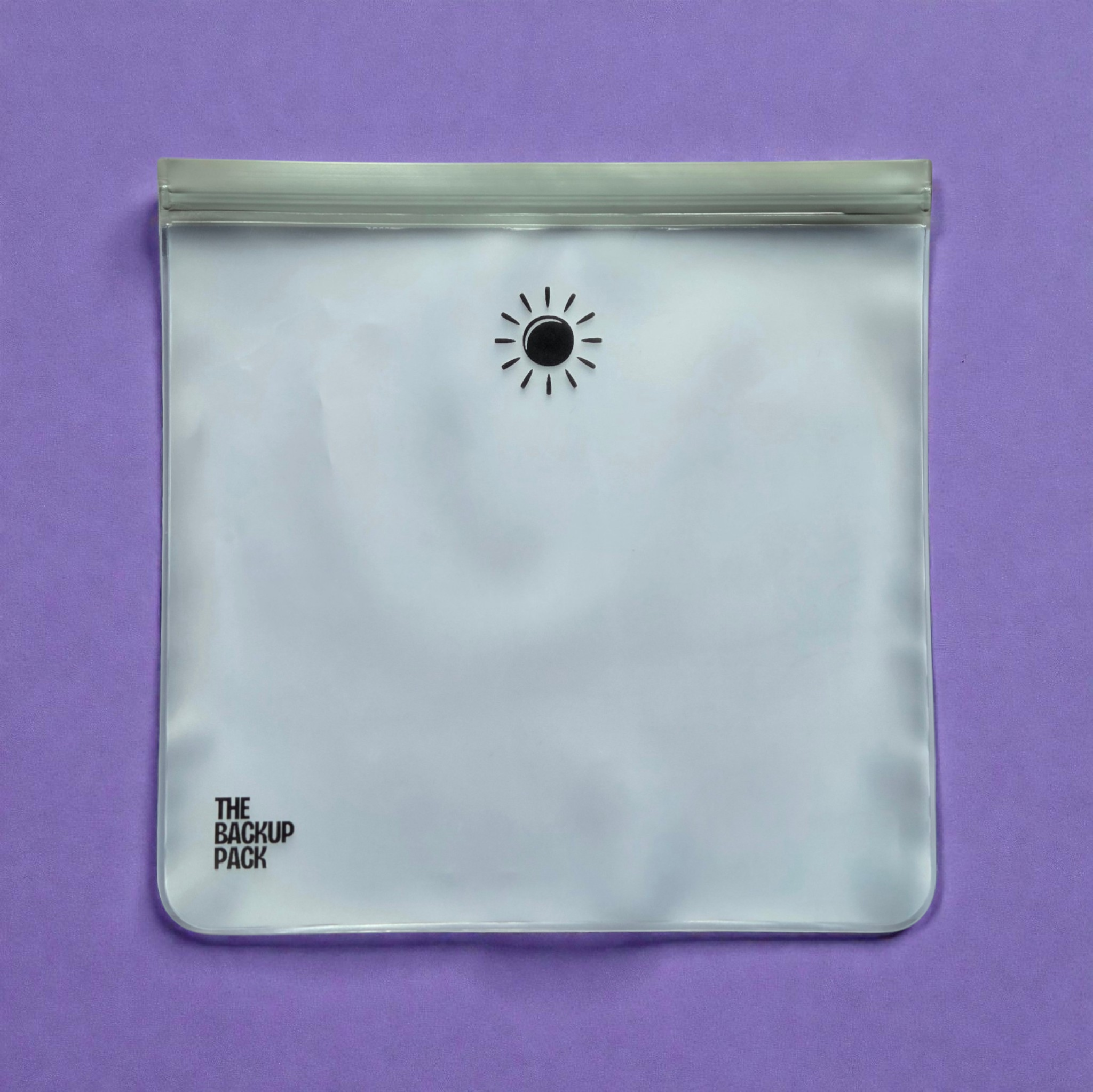 The Backup Pack PEVA reusable waterproof sleeve, sun and cloud designs holds full child's outfit - Wet/Dry Bag.